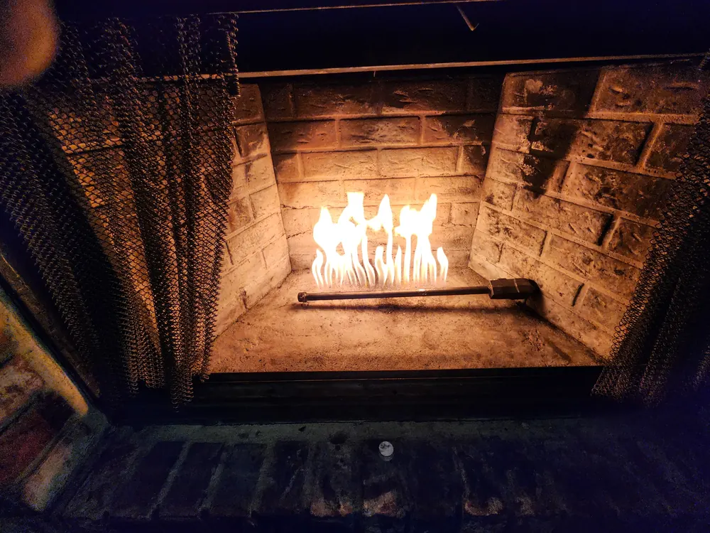 Fire burning in the fireplace after service