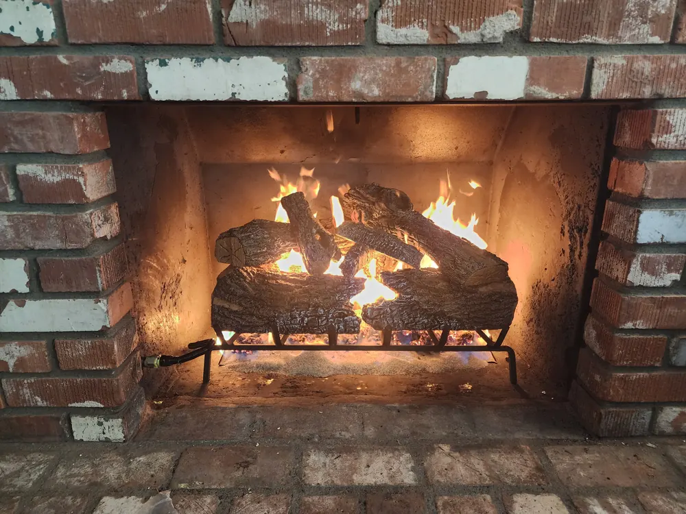 Brick fireplace operating after service