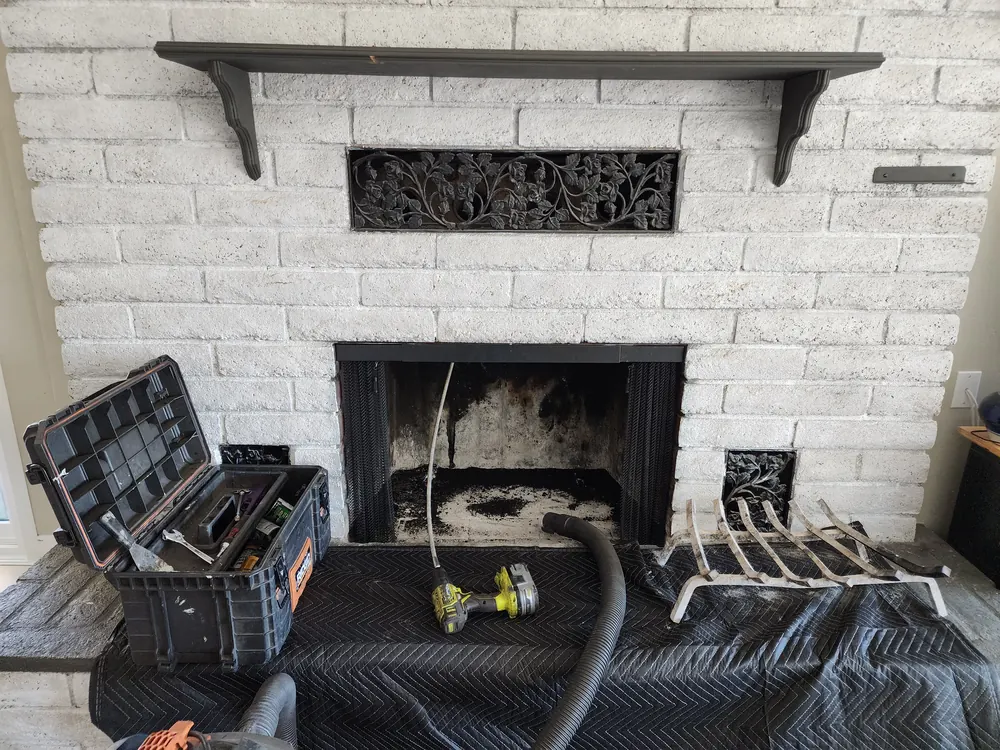 Fireplace prepared for inspection after the homeowner noticed a problem